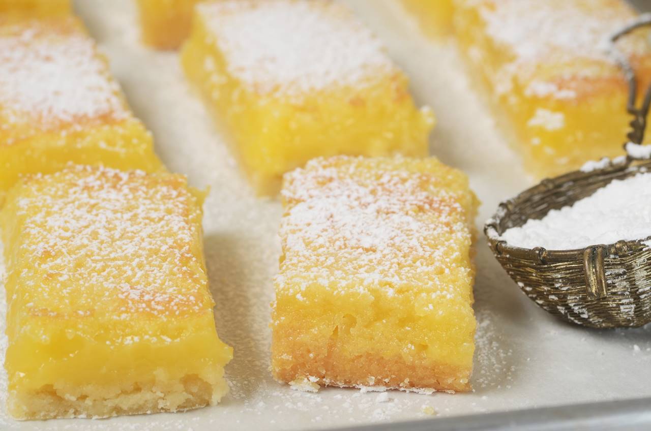 These Bars have a crisp and crumbly shortbread crust that is topped with a ...